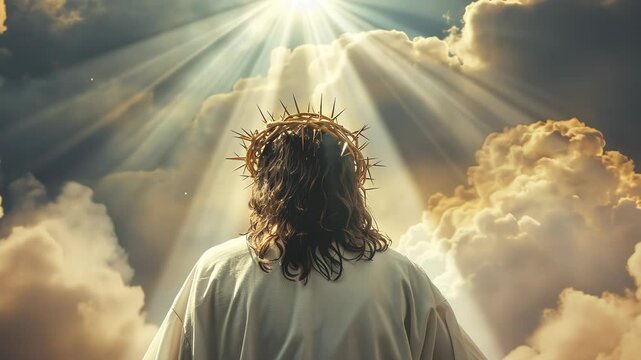 Jesus in white clothes and with a golden crown of thorns on his head on a heaven background, back view. Video 4K