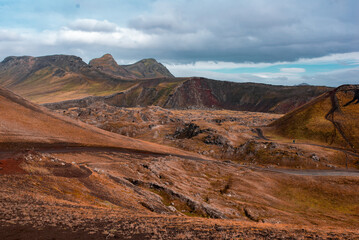 Colorful Volcanic Landscape with Winding Dirt Road
