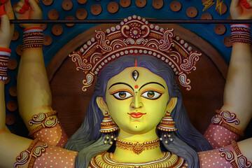 Idol of Goddess Devi Durga in a beautifully decorated pandal during the Durga Puja festival of...