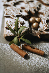 hand-decorated christmas cookies on a wooden background