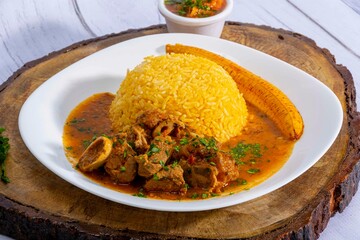 A mouthwatering dish of Seco de chivo chancho featuring a rich and savory sauce, served with tender...