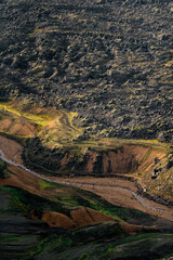 Majestic Mountain Landscape with Winding River and Rolling Hills