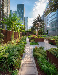 The greenery showcases a sustainable urban design with rain gardens and permeable surfaces strategically placed for managing stormwater runoff

