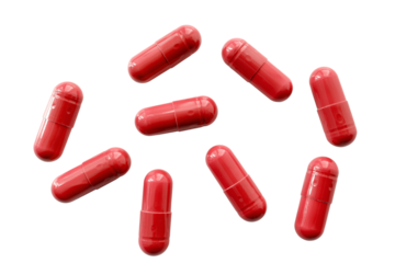 Red medicine capsules and remedy pills, pharmaceutical cure, antibiotics or painkillers isolated on transparent background