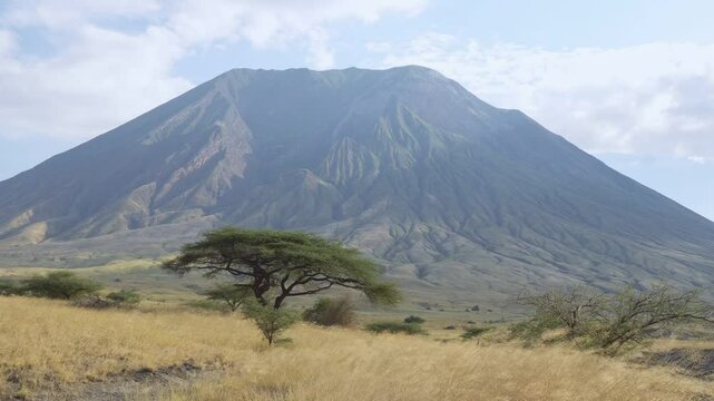 Tanzania Ol Doinyo Lengai volcano with a stunning mountain backdrop