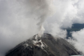 Russia Kamchatka volcano eruption on a cloudy summer day