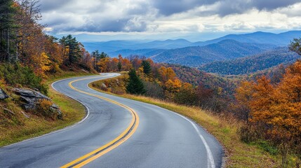 Naklejka premium Winding mountain road leading to a scenic overlook