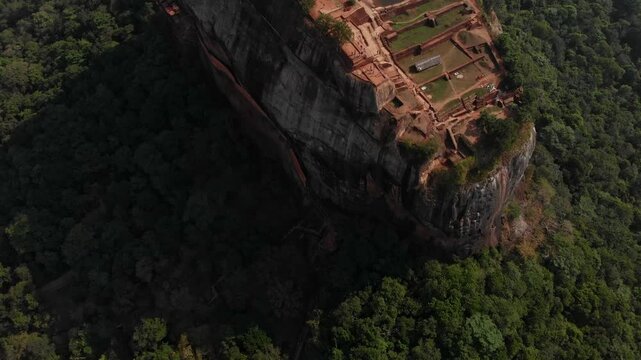 Aerial view of the ancient lion rock fortress surrounded by lush jungle, Sigiriya, Sri Lanka.