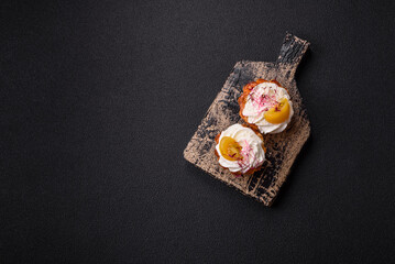 Sweet or sour cupcake with cream cheese, microgreens and filling