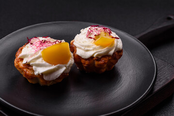 Sweet or sour cupcake with cream cheese, microgreens and filling