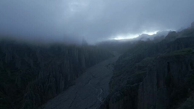 Aerial view of the rugged and mystical Las Animas in a foggy twilight, Valle de las Animas, La Paz, Bolivia.