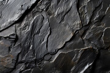Black or dark gray rough grainy stone texture bacground