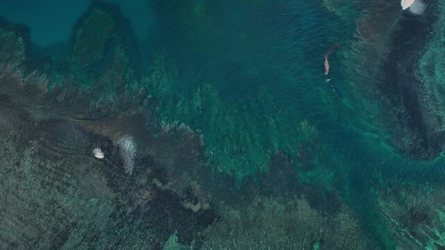 Aerial view of tropical island reef in the pacific ocean, Tuamasaga, Samoa.