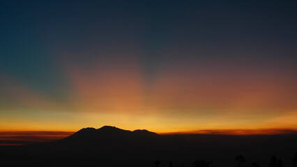 silhouette of mountains on the horizon