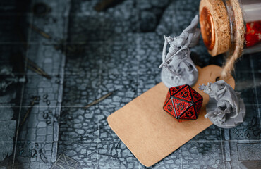 Dice 20 on table create fantasy story old school game style with role playing and board games hobby
