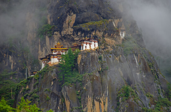Tiger nest monastery in Bhutan on mountain top on a cloudy day.