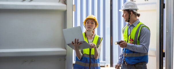 Foreman or worker work at Container cargo site check up goods in container. Foreman or worker...
