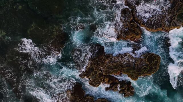 Aerial view of tropical island reef with beautiful ocean waves, Tongatapu, Tonga.