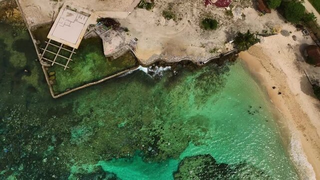 Aerial view of a beautiful tropical island with pristine beaches, turquoise waters, and palm trees, Shefa Province, Vanuatu.