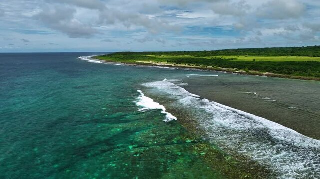 Aerial view of a beautiful tropical island with pristine beaches and lush greenery, Shefa Province, Vanuatu.