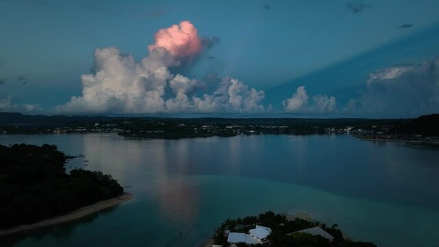 Aerial view of tranquil sunset over a beautiful tropical island in the Pacific Ocean, Shefa Province, Vanuatu.