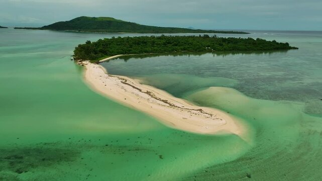 Aerial view of a tropical paradise with a serene sandbar and lush reef, Shefa Province, Vanuatu.