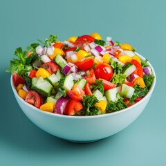 Vibrant mixed vegetable salad showcasing fresh produce against a serene teal background