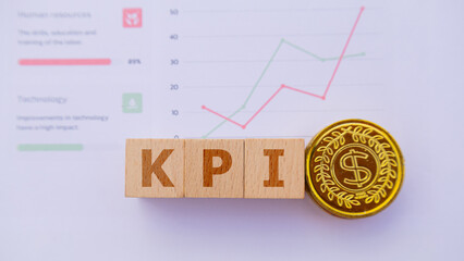 Wooden cube with the word KPI. It is an abbreviation of Key Performance Indicator. Business...