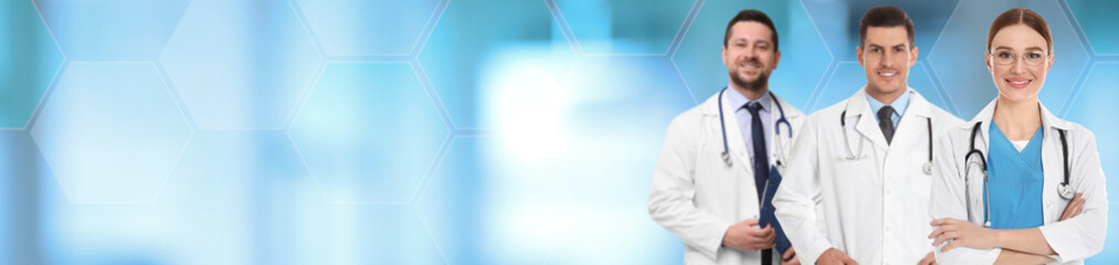 Doctors on blurred background. Banner design with space for text