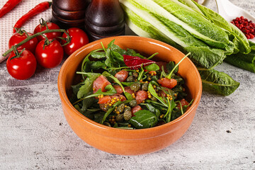 Salad with salmon and arugula