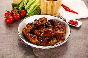 Grilled pork ribs in barbecue sauce