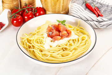 Pasta spaghetti with salmon and stracciatella