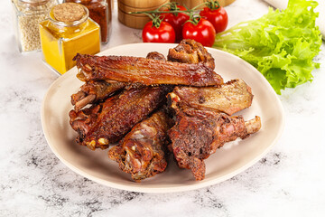 Roasted duck wings with sauce