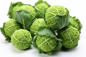 Fototapeta premium Fresh green cabbages arranged neatly against a light background highlighting their textures