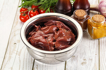 Raw chicken liver uncooked in the bowl