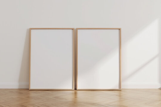 Two frames on floor mockup blank poster. Wooden frames mock up empty print background. Wood picture frames in room. Gallery design modern interior