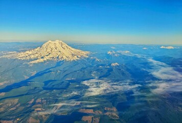 view of the top of the snowy mountain from the air
