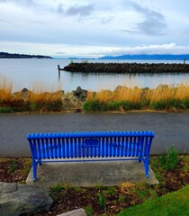 Sandy beach, ocean waves, sunset.