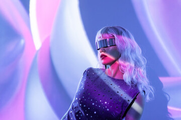 Stylish woman in metaverse attire with futuristic visor