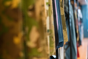Fabric for sale at the store in close up view.