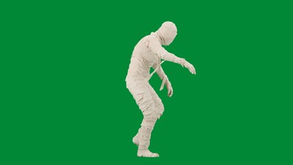 Portrait of person in a mummy bandage on chroma key green screen background. Mummy covered in white cloth ribbons walking with hands up.