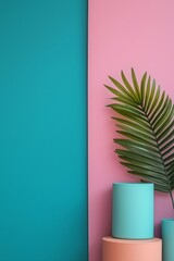 Fototapeta premium Teal and pink background showcasing geometric shapes and a green palm leaf in an abstract arrangement.
