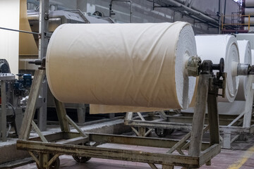 Fabric batching process machine industrial plant line in a textile factory.