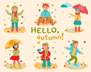 A set of children walking outside in autumn. Girls and boys are playing with falling leaves.