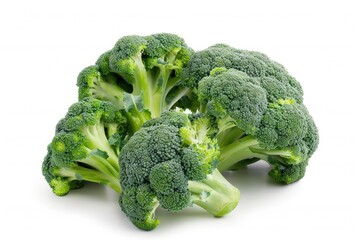 A bunch of green broccoli florets arranged neatly on a white plate, great for food or health-related imagery