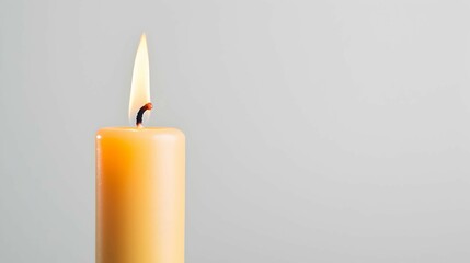 Burning Candle on White Background