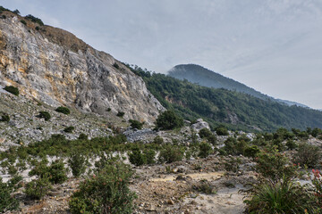 Rocky Cliffside Overlooking a Verdant Valley