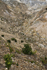 Rocky Cliffside Overlooking a Verdant Valley