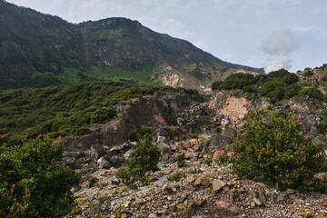 Rocky Landscape Beneath Majestic Mountains