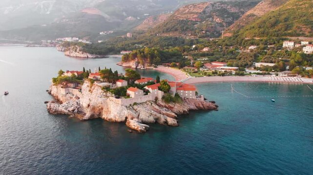 Amazing drone video of the small old town of Sveti Stefan and resort Petrovac in Montenegro.